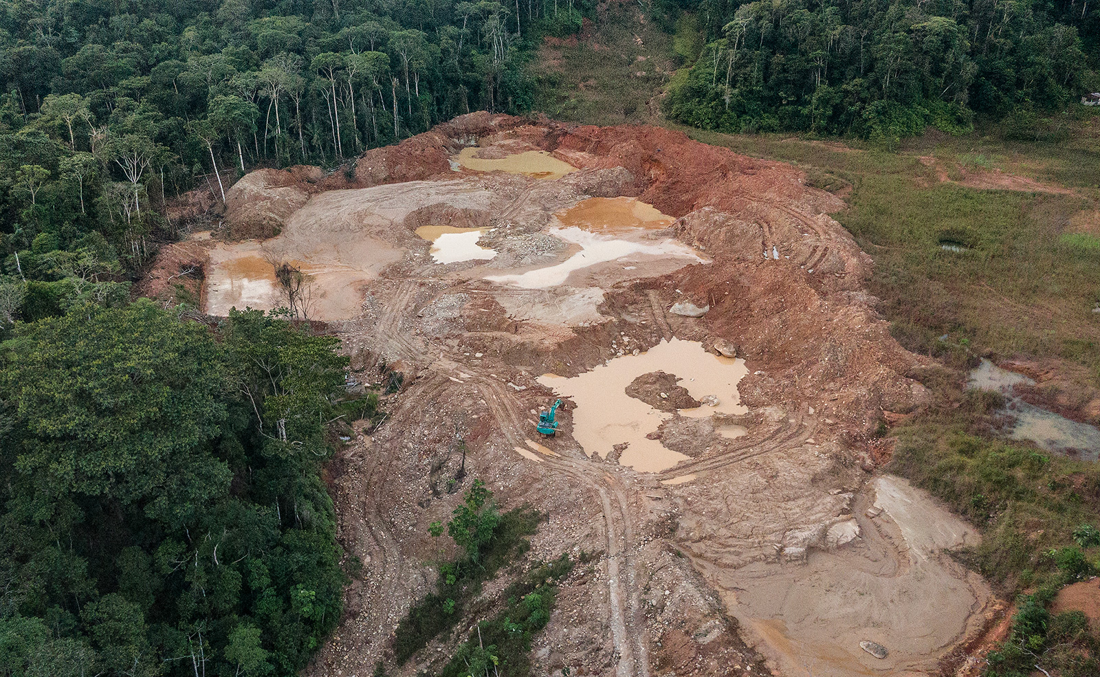 Open-pit gold mining operation near Pitalala Reserve