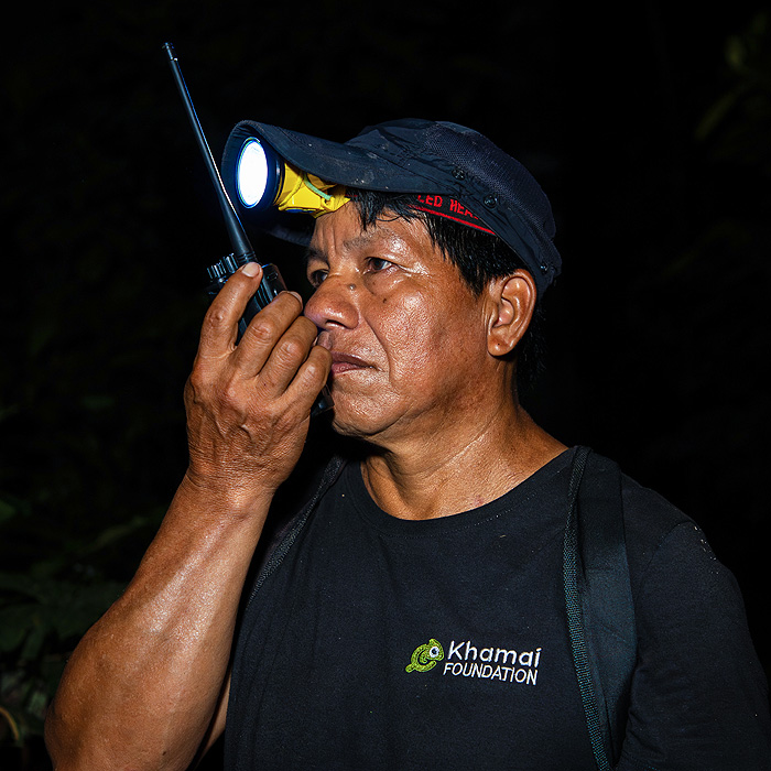 Image showing park ranger Marco Andi talking on the radi